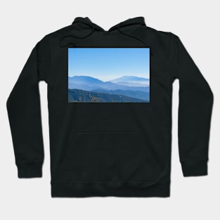 Blue mountain landscape backdrop in tiered tones Hoodie